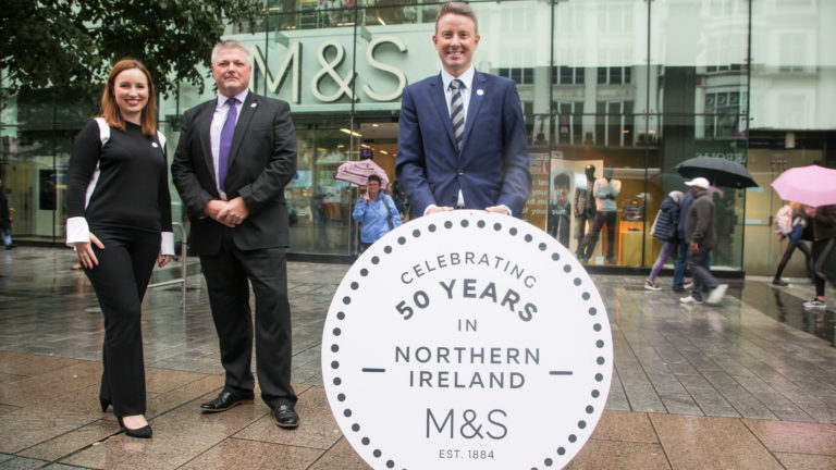 Marks & Spencer today (7th September) celebrate their milestone 50th anniversary of trading in Northern Ireland. The company opened its first store on Donegall Place, Belfast on 7th September 1967, paving the way for UK investment into the local retailing market. Pictured are (l-r) Lynsey Beatty (M&S 50 Years Project Co-ordinator), Colin McGreevy (M&S Belfast Store Manager) and Ryan Lemon (M&S Head of Region for Northern Ireland).